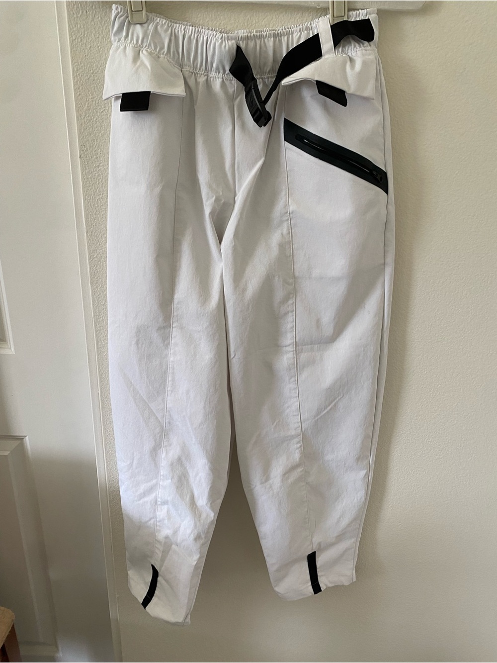 White Cargo Pants with Black Trim and Utility Pockets